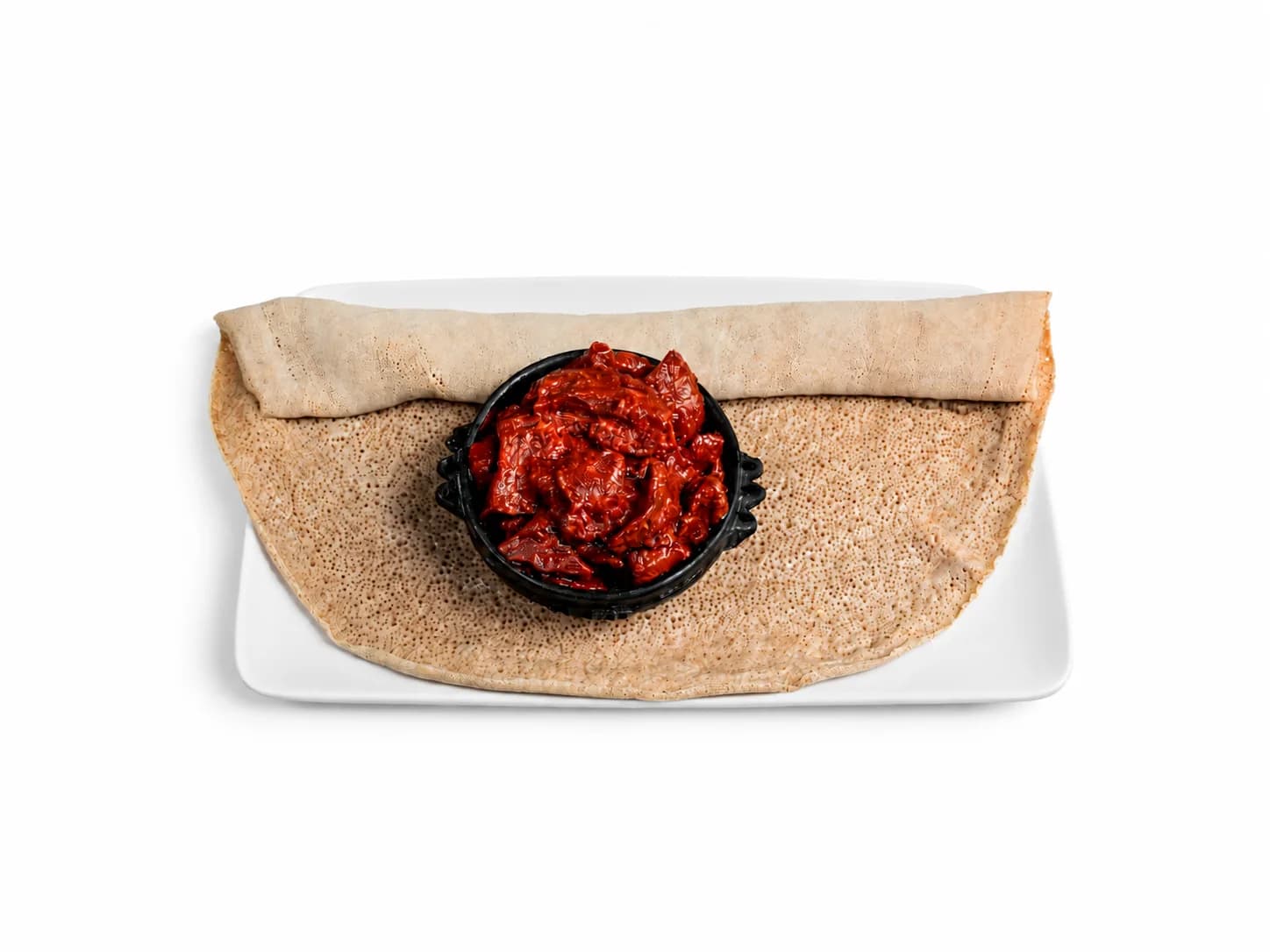 Gored Gored with ayib, gomen and injera
