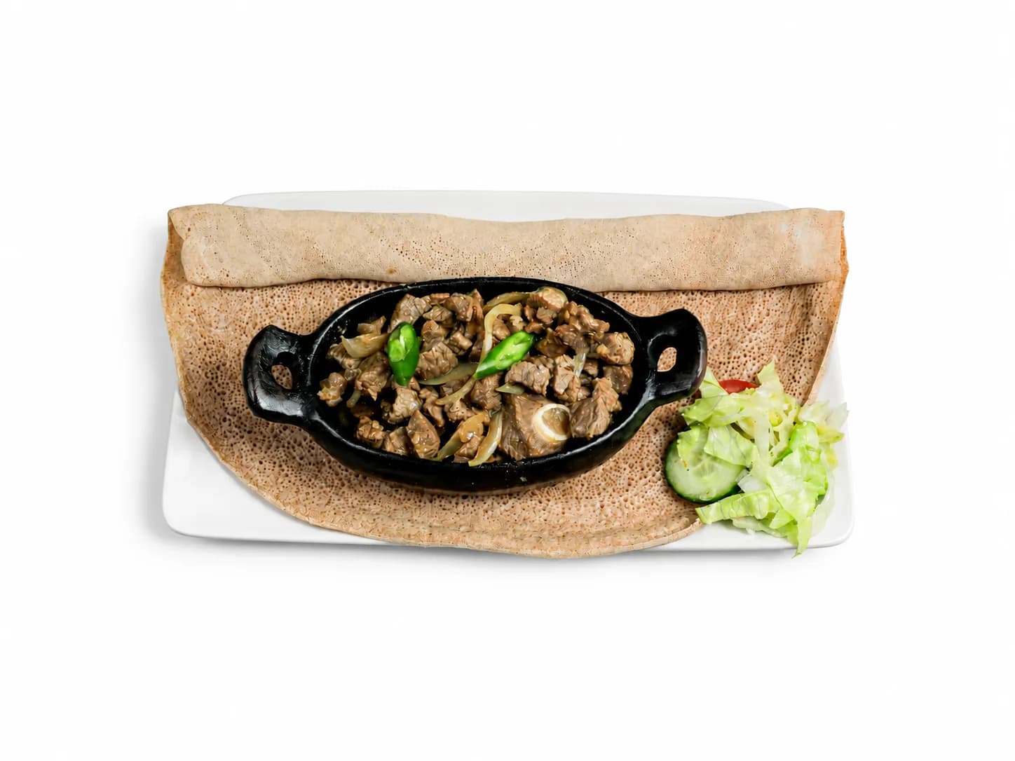 Nech Tibs with onions, salad and injera