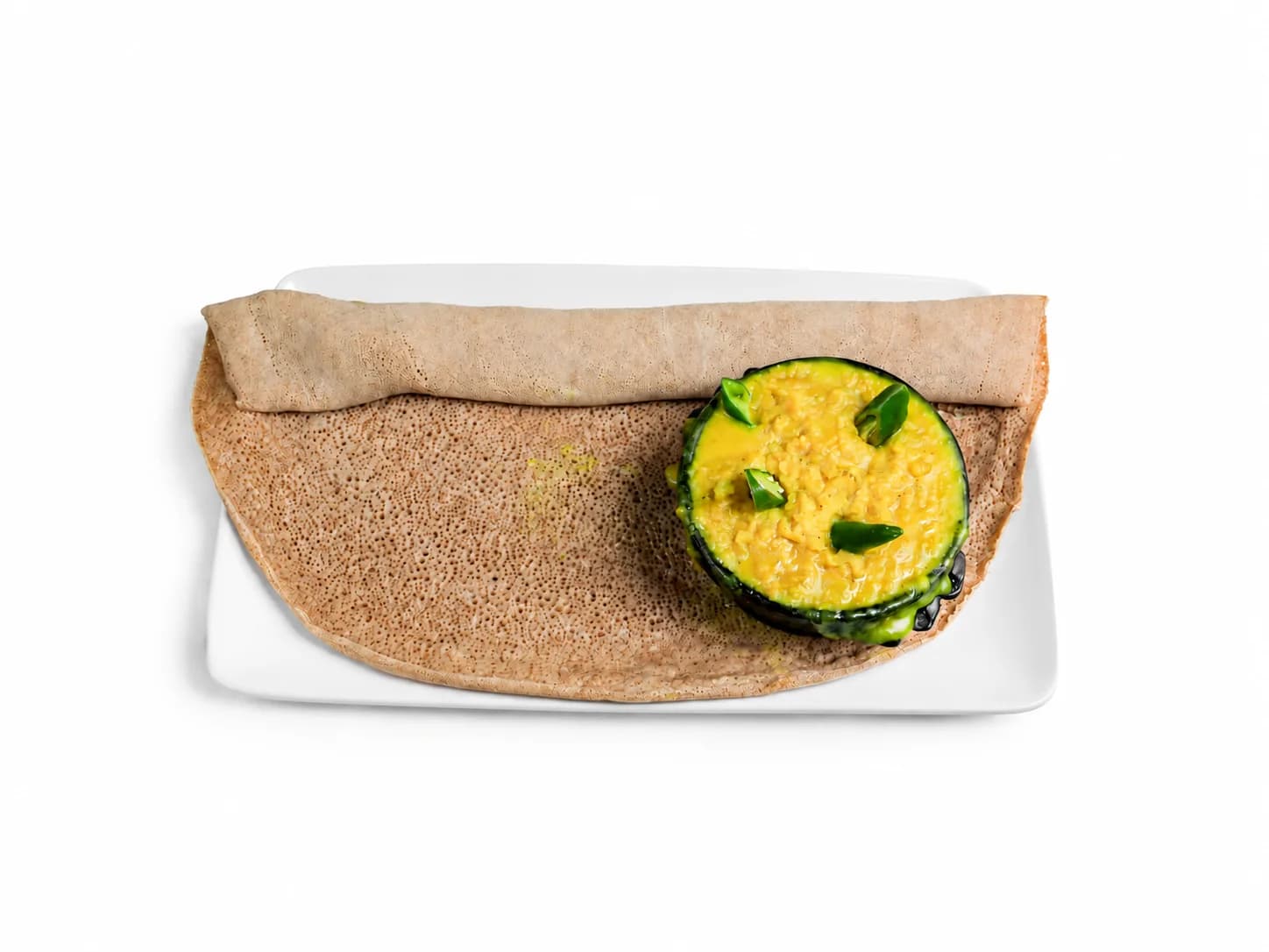 Yellow lentils with green chilli and injera