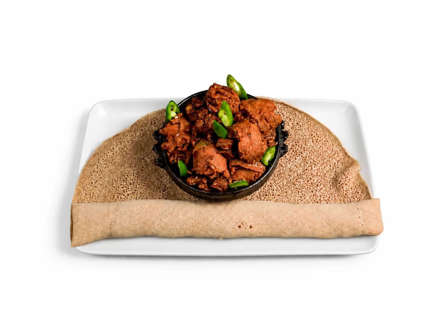 Yetibs Firfir with spiced meat and injera